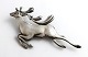 Lundin Antique 
presents: 
Silver 
brooch in the 
shape of a deer 
(830). Length 8 
cm.