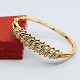 Antik 
Damgaard-
Lauritsen 
presents: 
Bangle 
with diamonds 
in 18k gold