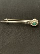 Antik Huset 
presents: 
Silver 
brooch with 
inlaid jade
Stamped J&J 
830S
Length 4.5 cm