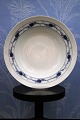 K&Co. presents: 
Royal 
Copenhagen Blue 
Rose large deep 
plate. Dia.: 
25cm.
RC# 408/8107. 
Before 1923...