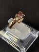 Antik Huset 
presents: 
Beautiful 
and elegant 
ladies' ring in 
8 carat gold, 
with inlaid 
pink stone. 
Size 50