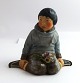 Lundin Antique 
presents: 
Royal 
Copenhagen. 
Porcelain 
figure. 
Greenlander 
boy. Model 
12419. Height 
9.5 cm. (1 ...