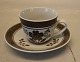 Klosterkælderen 
presents: 
Brown 
Tranquebar 
2124-45 Mocha 
cup 9 cl / 5 cm 
& saucer 11.6 
cm Aluminia 
Faience
