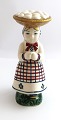 Lundin Antique 
presents: 
Aluminia 
Child Help 
figure. The 
wife with the 
eggs from 1947. 
Height 15 cm