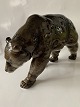 Antik Huset 
presents: 
Porcelain 
figure shaped 
like a bear, 
German-made 
L.H.S