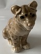 Antik Huset 
presents: 
Lion cub 
in porcelain 
from Bing & 
Grøndal, 1st 
assortment, 
deck. No. 1923, 
Mg.