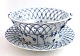 Lundin Antique 
presents: 
Royal 
Copenhagen. 
Blue fluted, 
full lace. 
Round fruit 
bowl with 
saucer. Model 
(1050 + ...