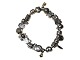 Antik K 
presents: 
Pandora 
silver
Bracelet with 
28 charms - two 
in gold