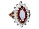 Antik K 
presents: 
14 ct. 
gold
Cocktail ring 
with opals and 
rubies - Size 
52