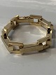 Antik Huset 
presents: 
Block gold 
bracelet 
chiselled, with 
3 rows in 14 
carat gold, 
stamped JA 585, 
with box clasp.