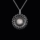Bestik.dk 
presents: 

Georg 
Jensen. 
Sterling Silver 
Daisy Pendant 
with black 
Enamel 33mm.