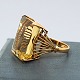 Antik 
Damgaard-
Lauritsen 
presents: 
A cocktail 
ring of 18k 
gold set with a 
topaz