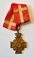 Pegasus – Kunst 
- Antik - 
Design 
presents: 
Military 
badge of 
honour, 16 
years in 
service, 20th 
century 
Denmark.