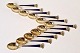 Karstens Antik 
presents: 
Set of 11 
coffee spoons 
in gold-plated 
sterling silver 
and blue enamel 
decorated with 
...