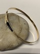 Antik Huset 
presents: 
Bracelet 
in 14 carat 
gold with 
white/black 
stone