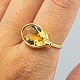 Antik 
Damgaard-
Lauritsen 
presents: 
Georg 
Jensen; A 
Savannah ring 
of 18k gold 
with a citrine