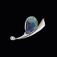 Bestik.dk 
presents: 
Birgitte 
Munch. Sterling 
Silver Brooch 
with 
Spectrolite, 
Gold and Topaz.