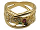 Antik K 
presents: 
21 carat 
gold
Large gold 
ring with 
diamonds, 
emeralds and a 
ruby - Size 53