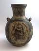 Lundin Antique 
presents: 
Royal 
Copenhagen. 
Stoneware. 
Vase. Model 
2938. Bode 
Willumsen. 
Height 21 cm. 
(1 quality)