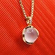 Antik 
Damgaard-
Lauritsen 
presents: 
A pendant 
in 14k gold set 
with a rose 
quartz and 
diamonds