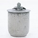 Roxy Klassik 
presents: 
Arne Bang 
/ Holmegaard 
stentøj
Jar in 
stoneware with 
bluish shades 
and decorated 
lid. ...