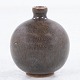 Roxy Klassik 
presents: 
Eva 
Stæhr-Nielsen / 
Saxbo
Round vase in 
stoneware with 
brownish glaze. 
Stamped by ...