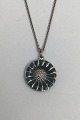 Danam Antik 
presents: 
Georg 
Jensen Sterling 
Silver 
Marguerit Daisy 
Pendant Olive 
green