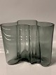 Antik Huset 
presents: 
Alvar 
Aalto vase, 
Smoke colored. 
Measures: 
12x15 cm.