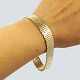 Antik 
Damgaard-
Lauritsen 
presents: 
A bracelet 
of 8k gold, w. 
12,5 mm