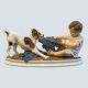 Antik 
Damgaard-
Lauritsen 
presents: 
Dahl 
Jensen; 
Porcelain 
figurine of boy 
and dog No. 
1072