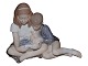 Antik K 
presents: 
Royal 
Copenhagen 
figurine
Two children 
reading