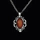 Bestik.dk 
presents: 
Georg 
Jensen. 
Sterling Silver 
Pendant with 
Amber.