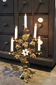 K&Co. presents: 
Antique, 
decorative 
French church 
candlestick in 
bronze with 
space for 5 
candles from 
the 19th ...