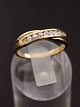 Middelfart 
Antik presents: 
8 carat 
gold ring with 
several clear 
stones