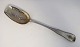 Lundin Antique 
presents: 
Silver 
cutlery (830). 
Strawberry 
spoon. Length 
29.5 cm. 
Produced 1844.