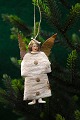 K&Co. presents: 
Antique 
Christmas tree 
ornament in the 
form of a small 
angel made of 
cotton wool and 
glossy ...