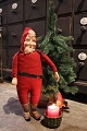 K&Co. presents: 
Antique 
Santa Claus 
from around 
1900 with straw 
body, painted 
papier mache 
face...