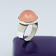 Antik 
Damgaard-
Lauritsen 
presents: 
Niels Erik 
From; A ring of 
sterling silver 
with rosa 
quartz