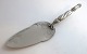 Lundin Antique 
presents: 
Georg 
Jensen. Silver 
cake server 
(830). Pattern 
no. 91. Length 
23.5 cm.