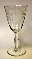 Pegasus – Kunst 
- Antik - 
Design 
presents: 
Rare clear 
drinking glass 
with 
advertising 
etchings, 20th 
century. ...