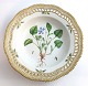 Lundin Antique 
presents: 
Royal 
Copenhagen. 
Flora danica. 
Deep plate with 
openwork edge. 
Diameter 24.5 
cm. Model ...