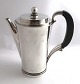 Lundin Antique 
presents: 
Georg 
Jensen. 
Pyramid. 
Sterling silver 
coffee pot 
(925). Model 
600A. Design 
Harald ...