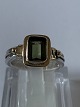 Antik Huset 
presents: 
Ladies' 
ring in silver 
with a green 
stone inlaid 
with gold, size 
57