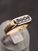 Middelfart 
Antik presents: 
14 carat 
gold ring with 
small sapphires