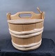 Antikkram 
presents: 
Round 
wooden Tejne 
(lunch box), 
probably from 
Sweden. H 
17.5cm - Ö 23cm