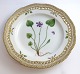 Lundin Antique 
presents: 
Royal 
Copenhagen. 
Flora Danica 
plate. Diameter 
25 cm. (3553). 
(1 quality). 
Viola ...