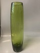 Antik Huset 
presents: 
Olive 
green vase from 
Holmegaard.
Height: 39 cm.