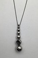 Danam Antik 
presents: 
Georg 
Jensen Sterling 
Silver Necklace 
with Pendant 
No. 441 Cave 
Jacqueline 
Rabun