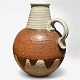 Roxy Klassik 
presents: 
Unknown
Floor vase/jug 
in stoneware 
with handle and 
earthly colors.
1 pc. in stock
