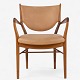 Roxy Klassik 
presents: 
Finn Juhl 
/ Niels Vodder.
NV 46 - Rare 
armchair in 
solid walnut 
and patinated 
natural ...